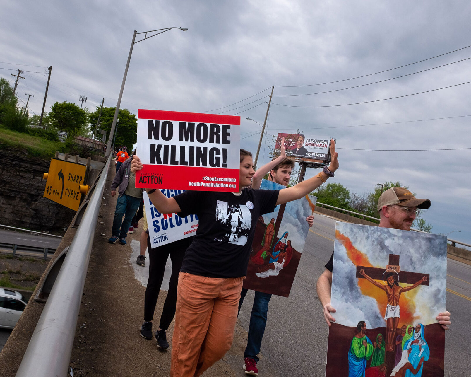 Anti-death-penalty protesters march through West Nashville on Easter Sunday